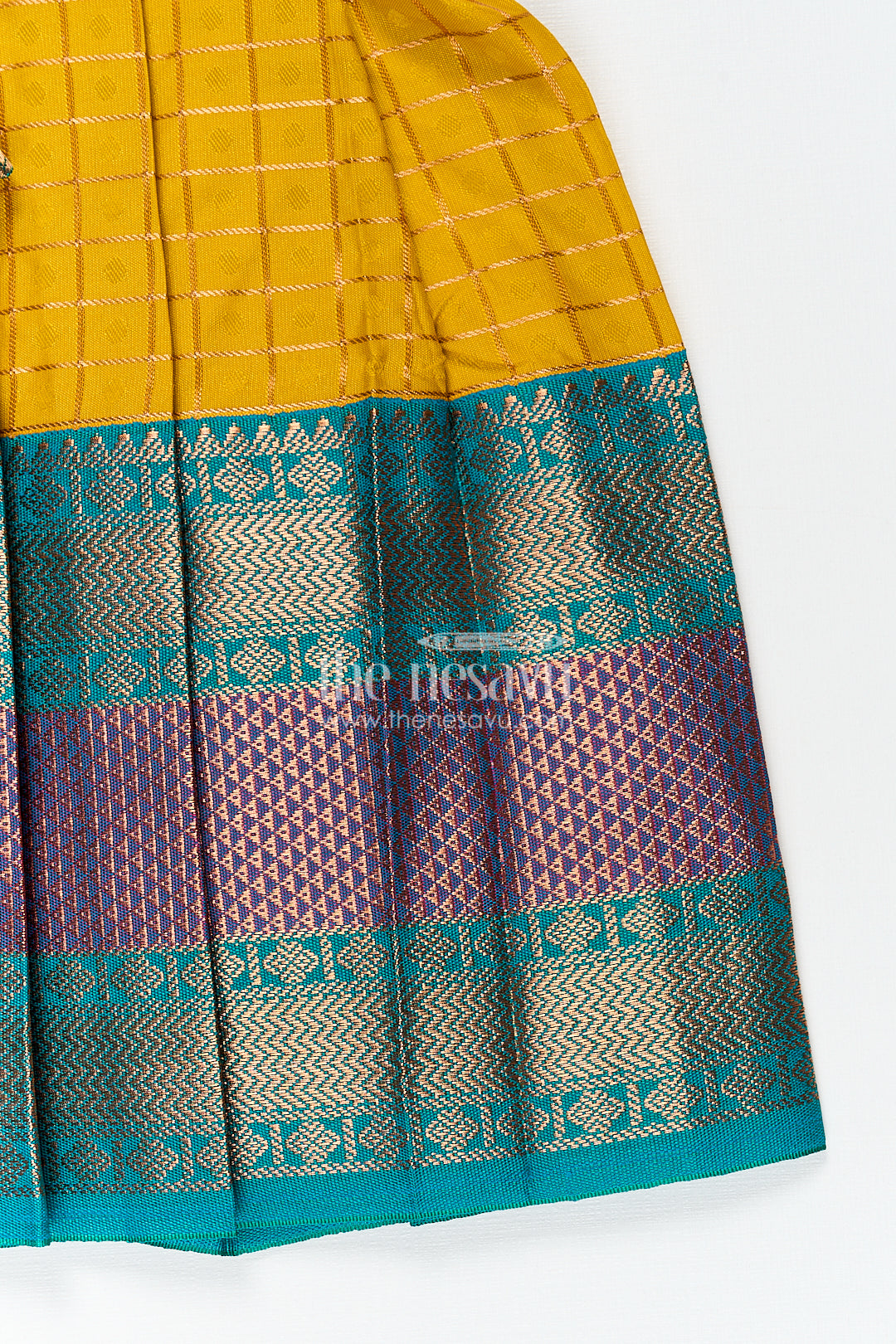 Girls Kanchivaram Ethnic Frocks in Mustard Yellow with Green Zari Overlay and Traditional Border Accents