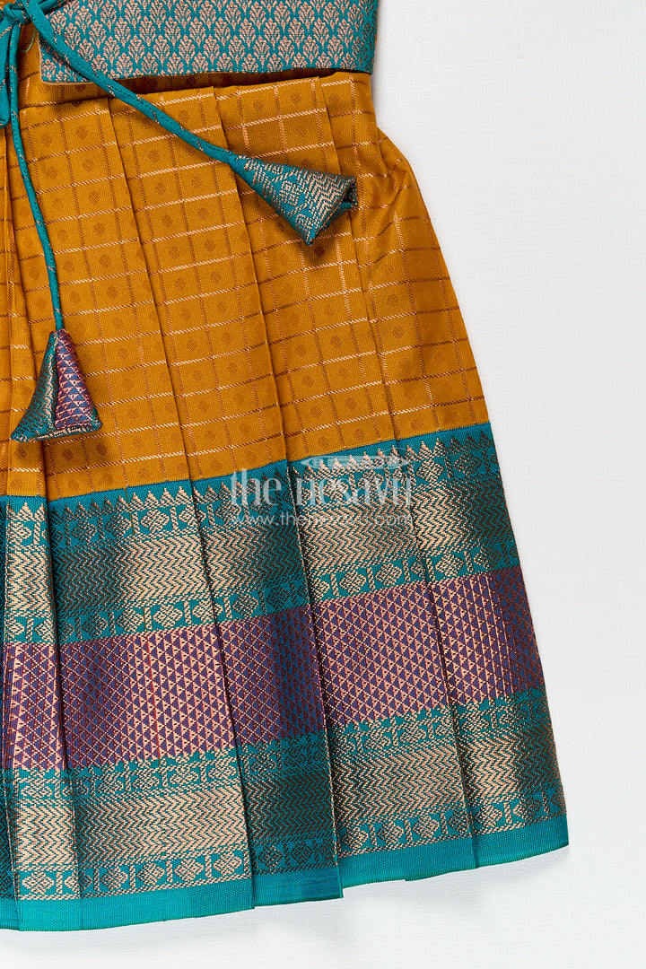 Girls Kanchivaram Orange Silk Frocks with Puff Sleeves Green Zari Overlay and Traditional Woven Border