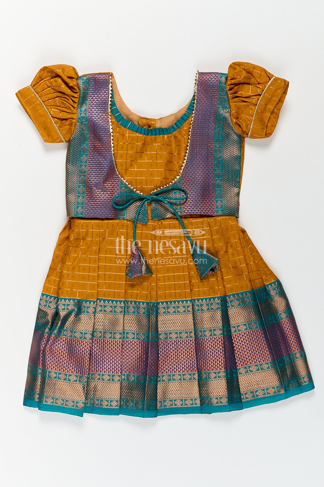 Girls Kanchivaram Orange Silk Frocks with Puff Sleeves Green Zari Overlay and Traditional Woven Border