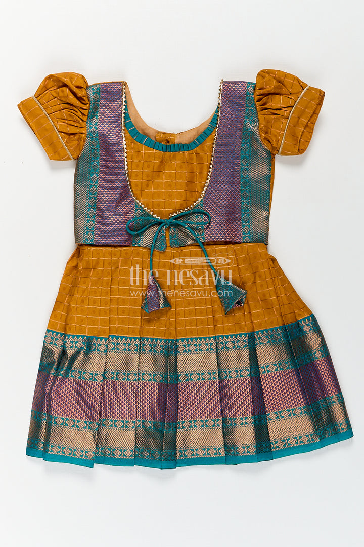 Girls Kanchivaram Orange Silk Frocks with Puff Sleeves Green Zari Overlay and Traditional Woven Border