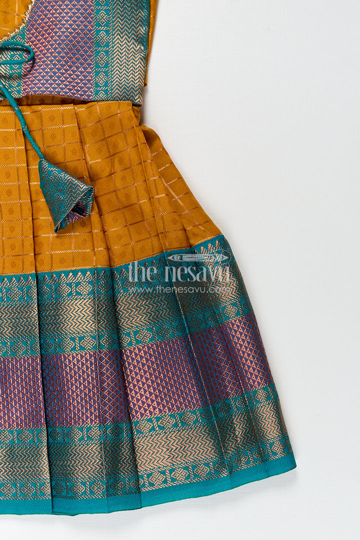 Girls Kanchivaram Orange Silk Frocks with Puff Sleeves Green Zari Overlay and Traditional Woven Border