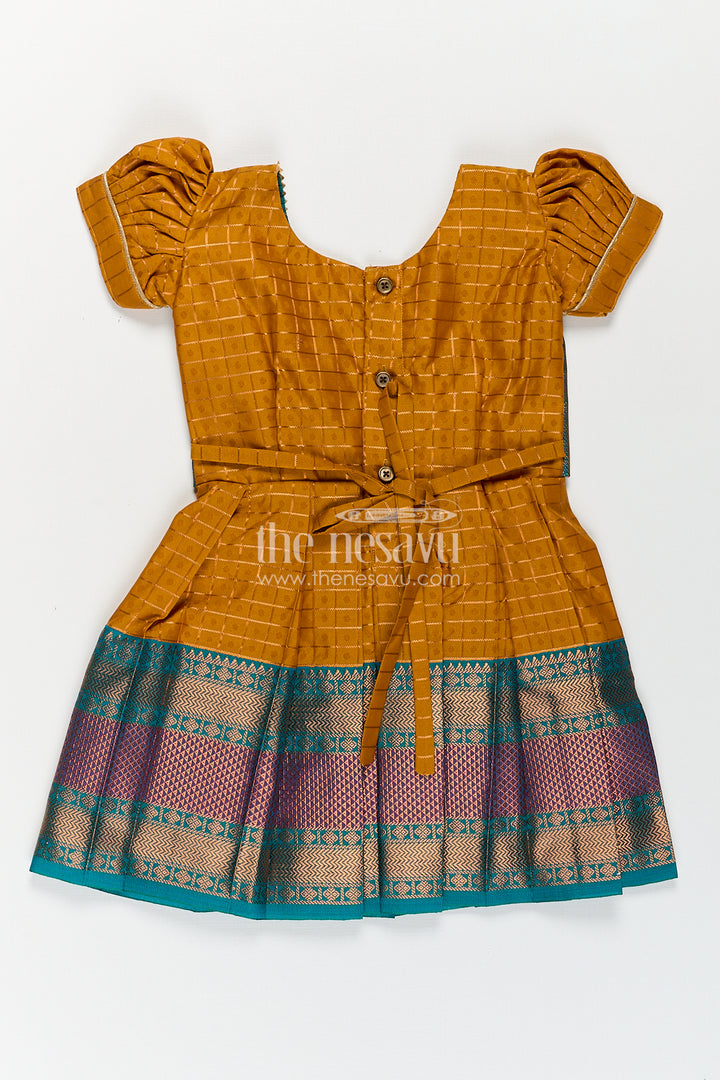 Girls Kanchivaram Orange Silk Frocks with Puff Sleeves Green Zari Overlay and Traditional Woven Border