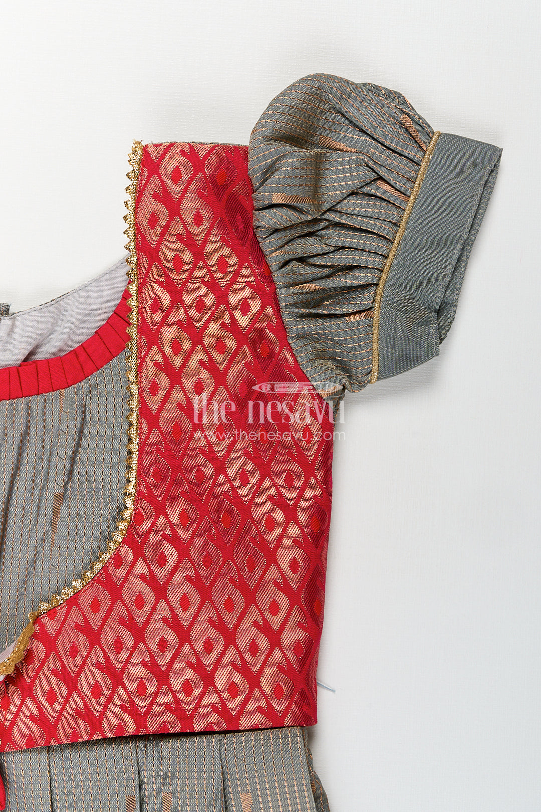 Girls Kanchivaram Long Pattu Frock with Puff Sleeves in Grey Silk and Rich Red Zari Border Finish