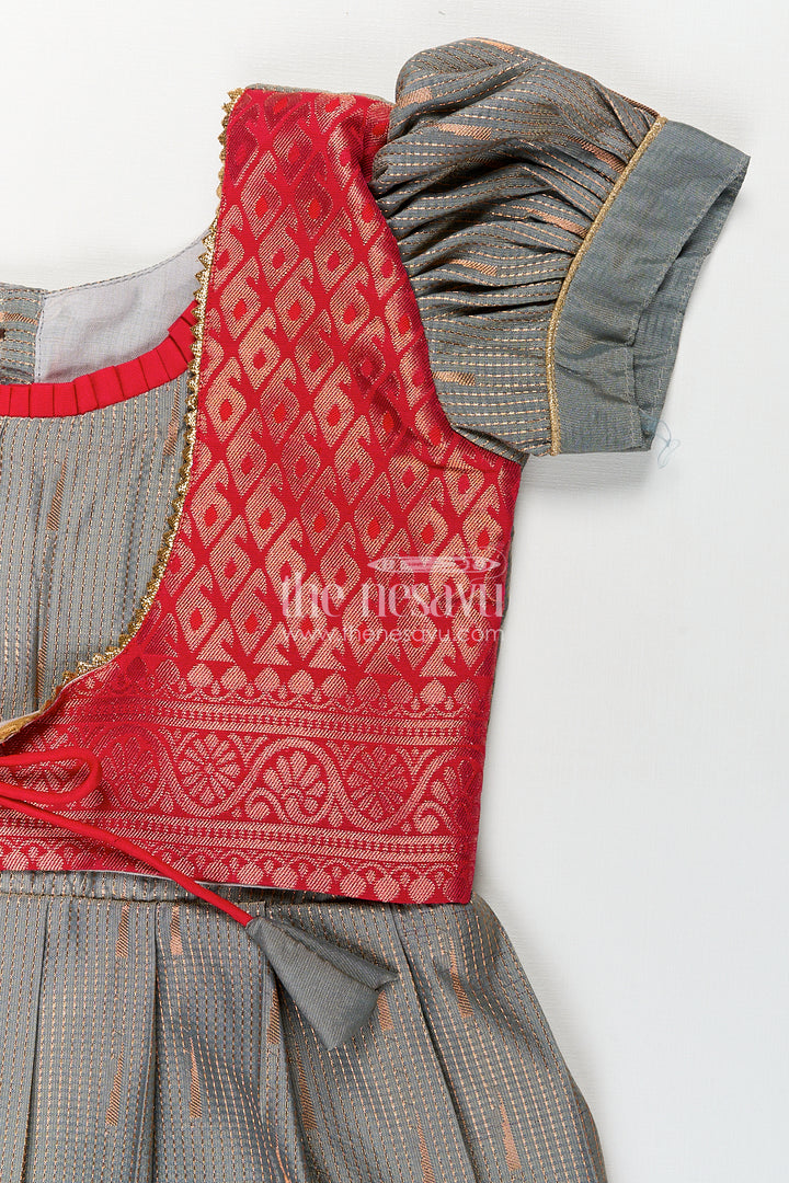 Girls Kanchivaram Long Pattu Frock with Puff Sleeves in Grey Silk and Rich Red Zari Border Finish