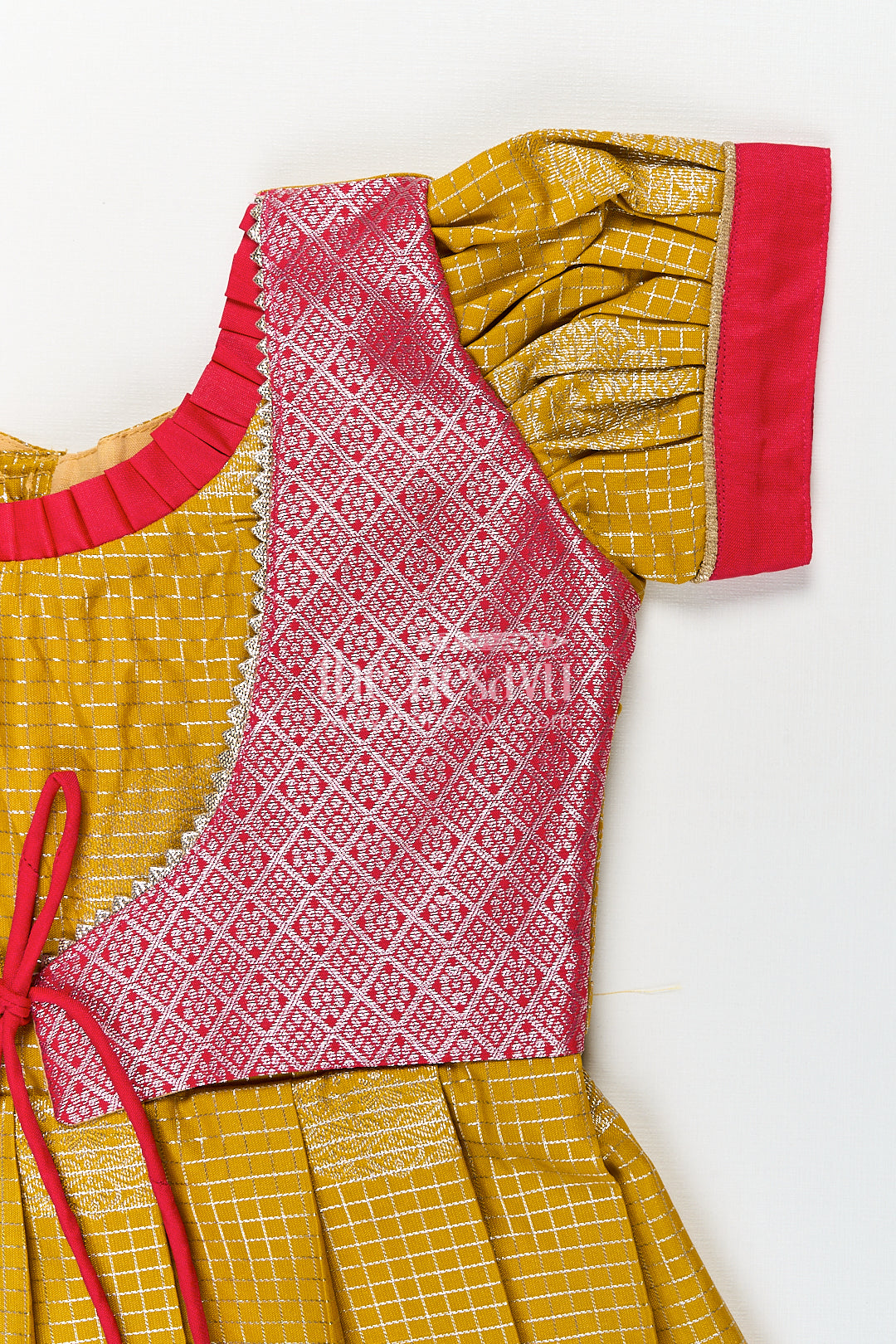 Girls Raw Silk Short Frocks in Semi Kanchivaram with Traditional Pink and Mustard Zari Border and Puff Sleeves