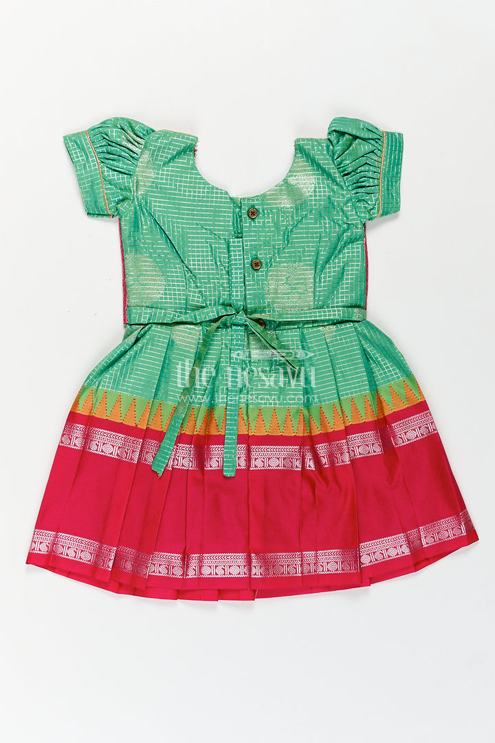 Girls Silk Material Frock Design in Semi Kanchivaram with Green Pleated Skirt and Pink Brocade Yoke