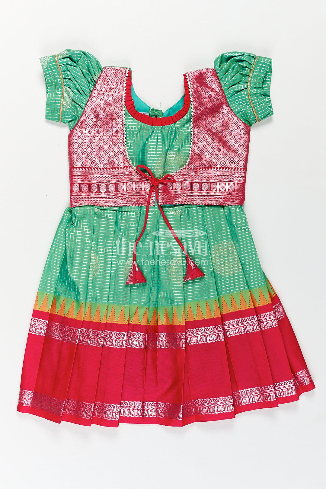 Girls Silk Material Frock Design in Semi Kanchivaram with Green Pleated Skirt and Pink Brocade Yoke