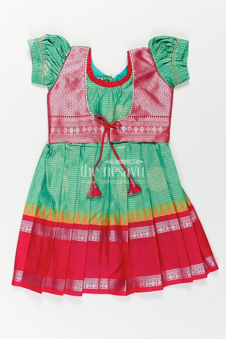 Girls Silk Material Frock Design in Semi Kanchivaram with Green Pleated Skirt and Pink Brocade Yoke