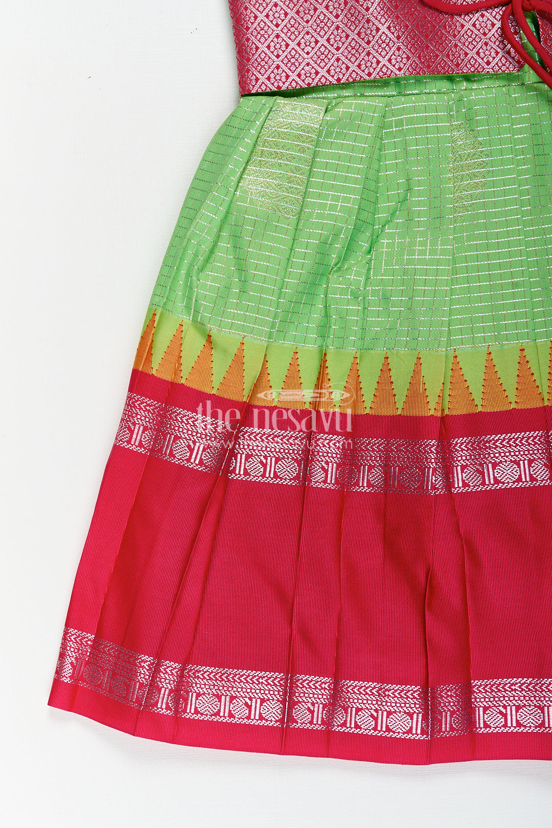 Girls Silky Long Frock in Semi Kanchivaram with Rich Pink Zari Pleats and Green Patterned Bodice