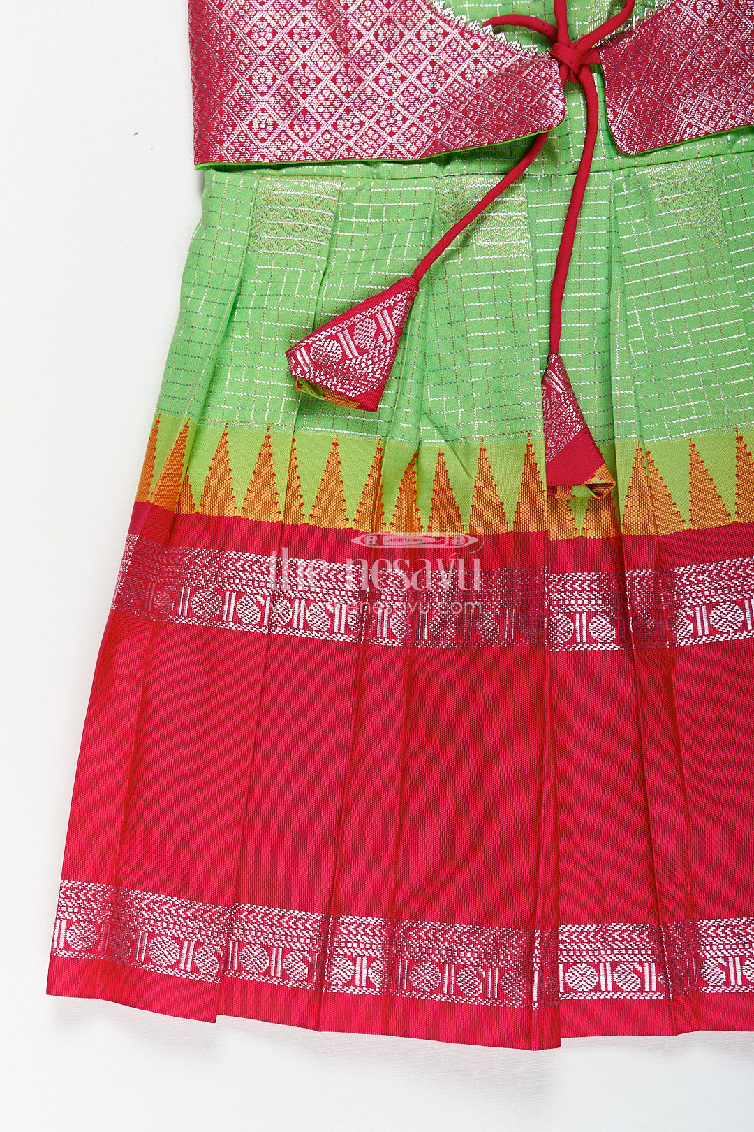 Girls Silky Long Frock in Semi Kanchivaram with Rich Pink Zari Pleats and Green Patterned Bodice