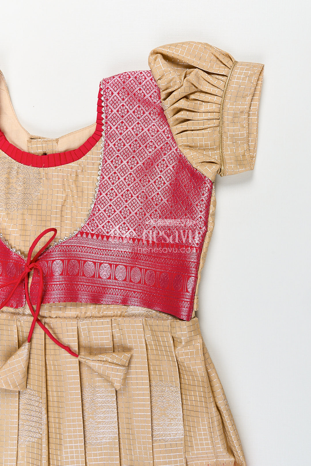 Girls Simple Silk Frocks in Semi Kanchivaram with Golden Bodice and Pink Zari Pleated Skirt and Puff Sleeves