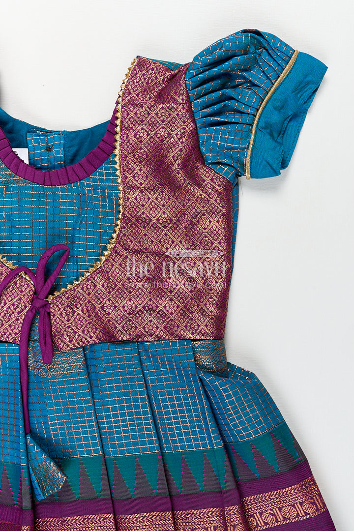 Girls Kanchivaram Frock Silk Design in Blue and Purple with Puff Sleeves and Rich Zari Woven Patterns