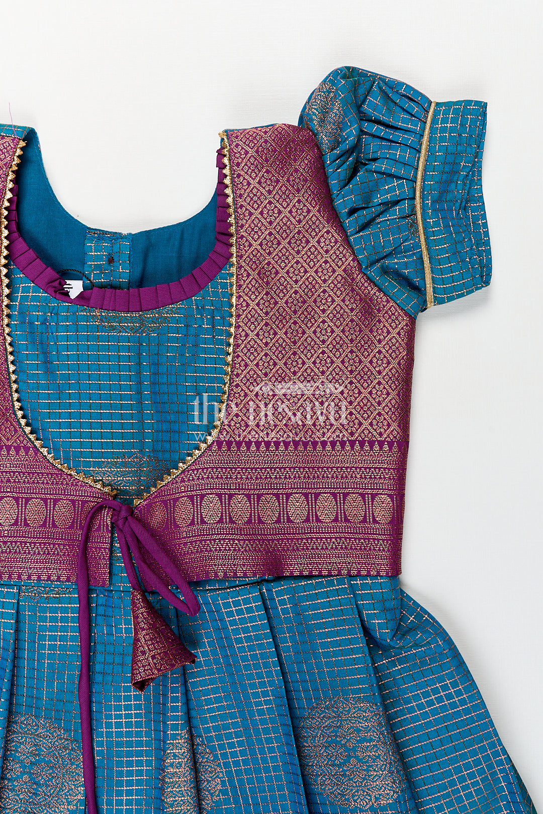 Girls Kanchivaram Frock Silk Design in Blue and Purple with Puff Sleeves and Rich Zari Woven Patterns