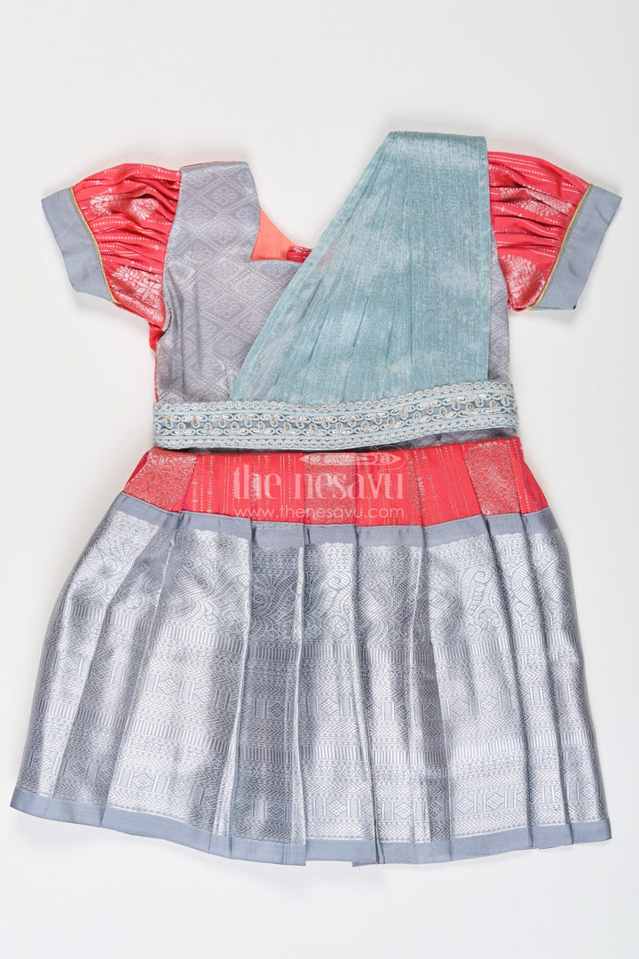 Girls Pattu Frock Model in Blue Semi Kanchivaram Silk with Red Accents and Lace Embellished Dupatta