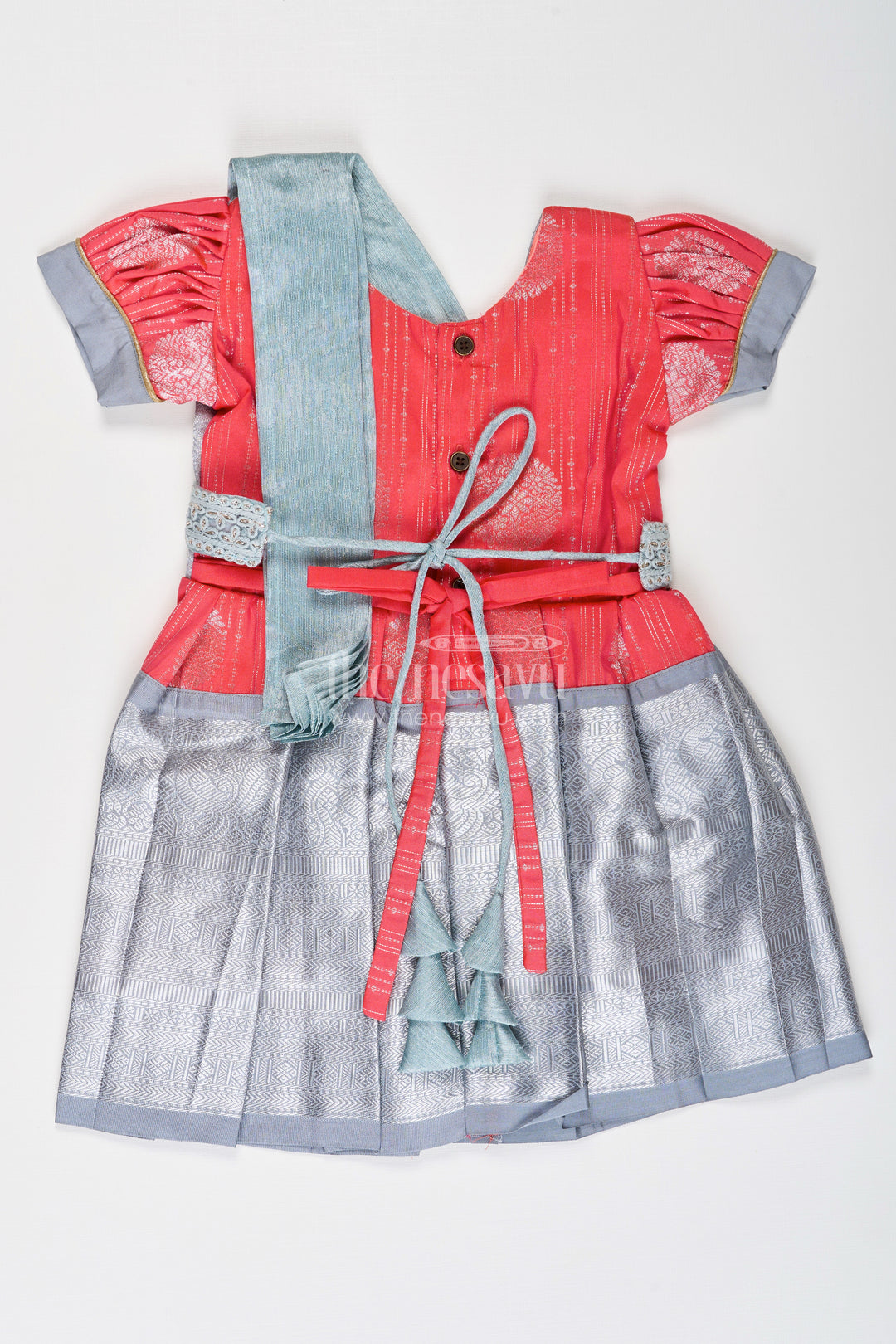 Girls Pattu Frock Model in Blue Semi Kanchivaram Silk with Red Accents and Lace Embellished Dupatta