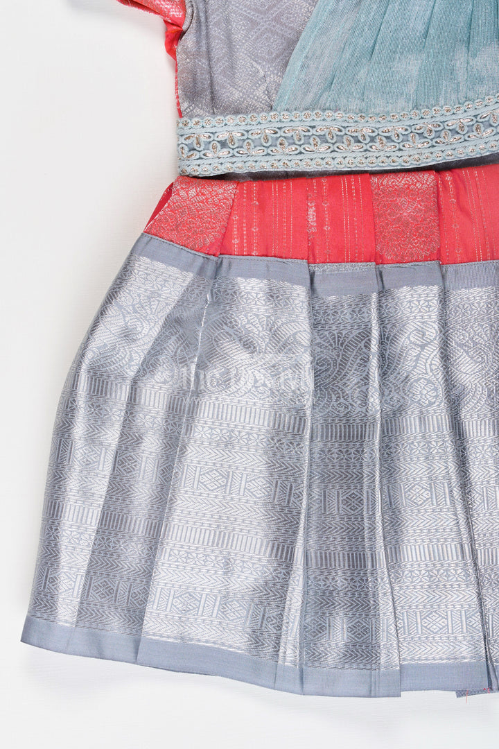 Girls Pattu Frock Model in Blue Semi Kanchivaram Silk with Red Accents and Lace Embellished Dupatta