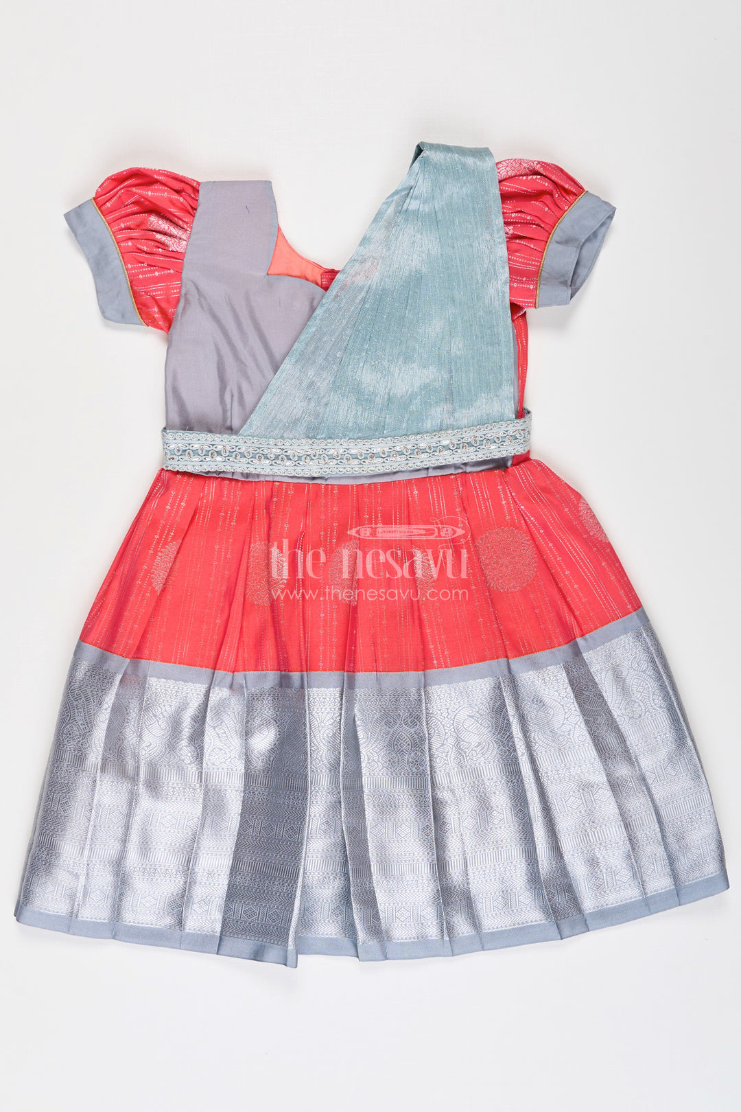 Girls Pattu Frock Model in Blue Semi Kanchivaram Silk with Red Accents and Lace Embellished Dupatta
