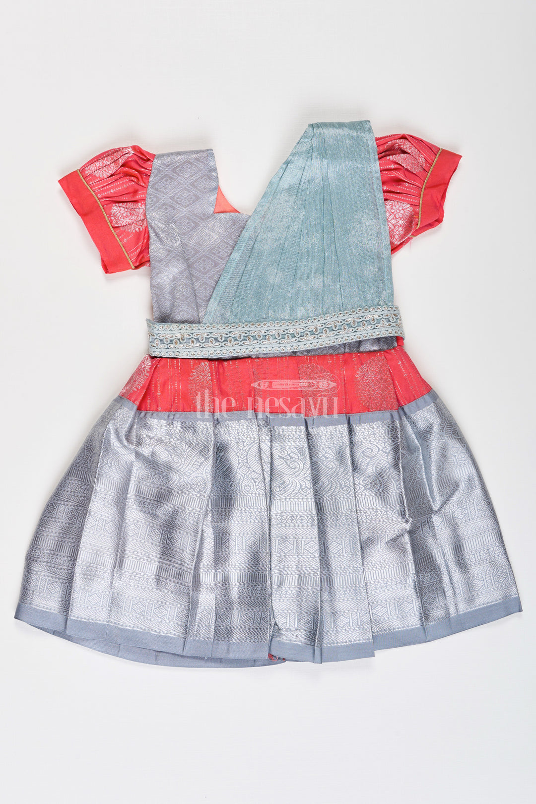 Girls Pattu Frock Model in Blue Semi Kanchivaram Silk with Red Accents and Lace Embellished Dupatta