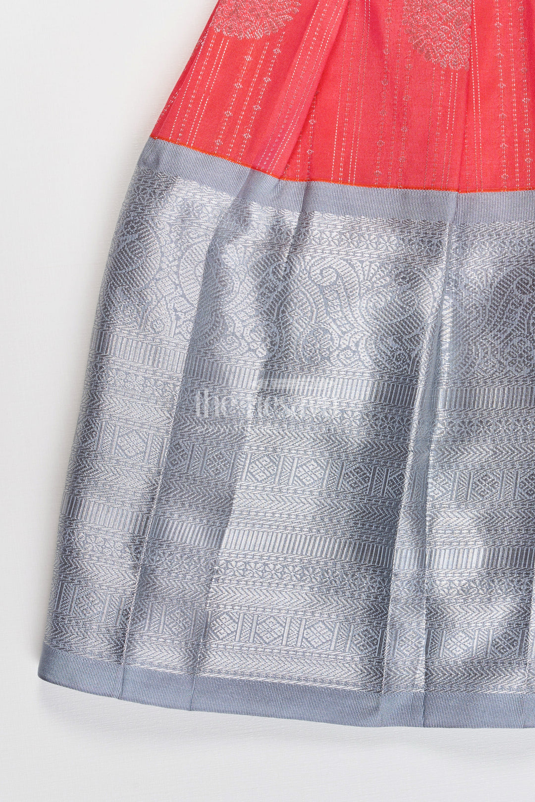 Girls Pattu Frock Model in Blue Semi Kanchivaram Silk with Red Accents and Lace Embellished Dupatta