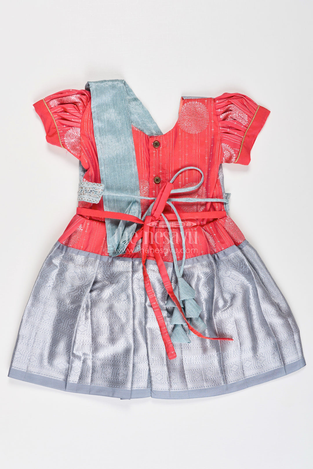 Girls Pattu Frock Model in Blue Semi Kanchivaram Silk with Red Accents and Lace Embellished Dupatta