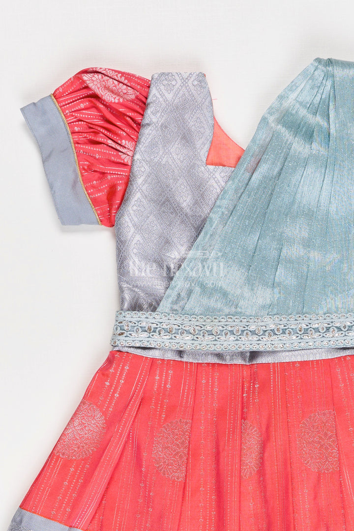 Girls Pattu Frock Model in Blue Semi Kanchivaram Silk with Red Accents and Lace Embellished Dupatta