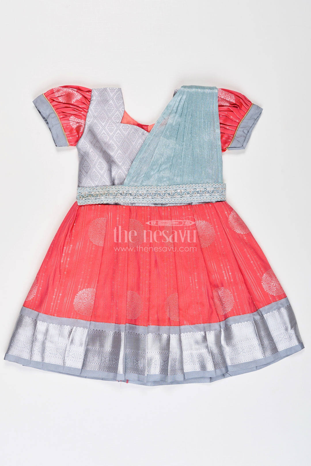Girls Pattu Frock Model in Blue Semi Kanchivaram Silk with Red Accents and Lace Embellished Dupatta