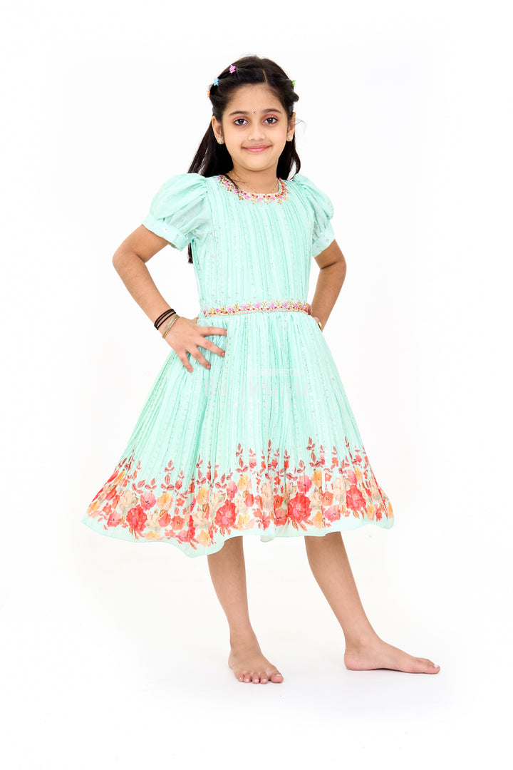 Mint Green Girls Fancy Frock with Floral Embellishments and Vibrant Border for Parties