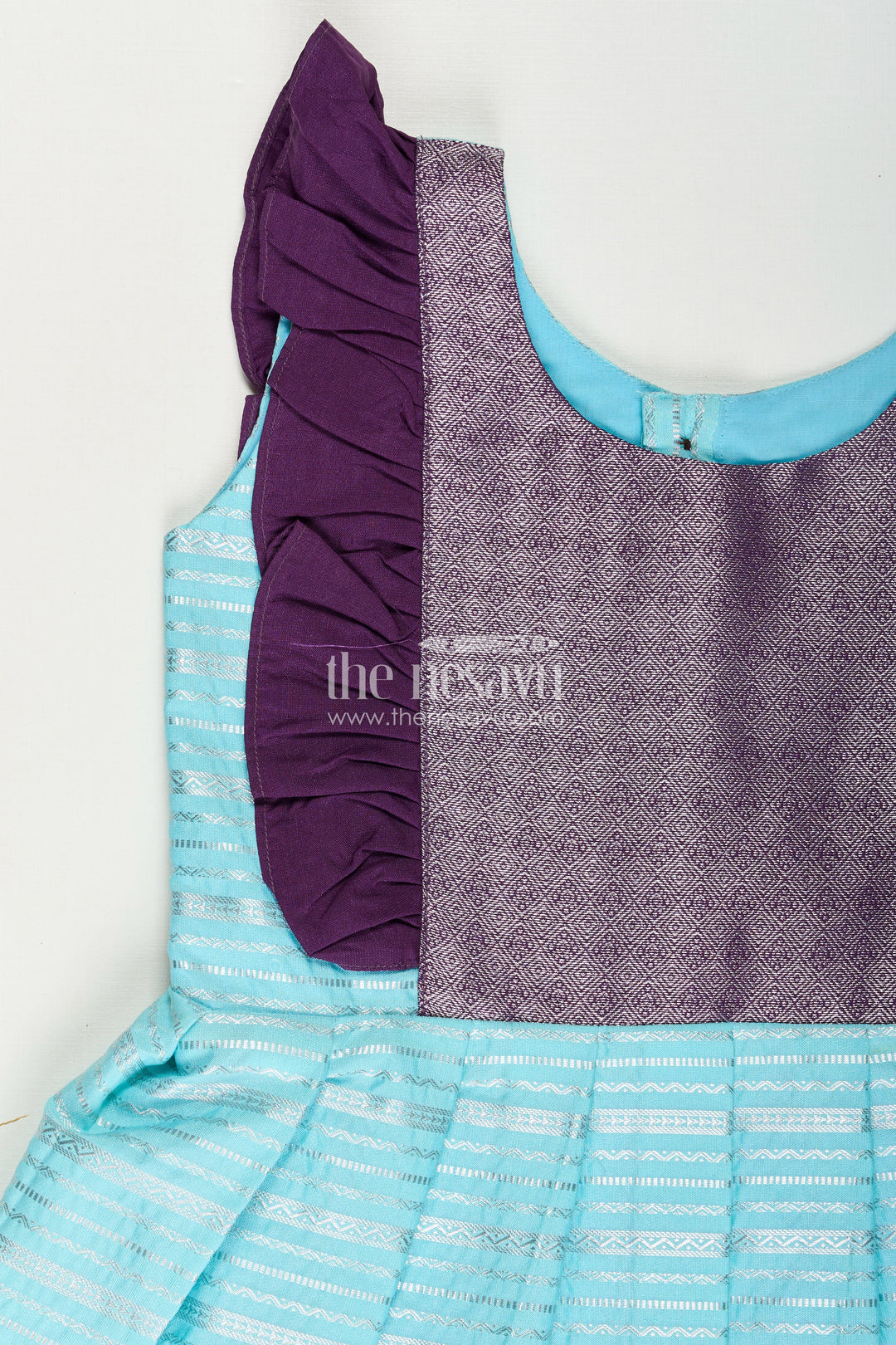 Girls Semi Kanchivaram Silk Frock with Layered Puff Sleeves and Contrast Borders in pleated dress Style