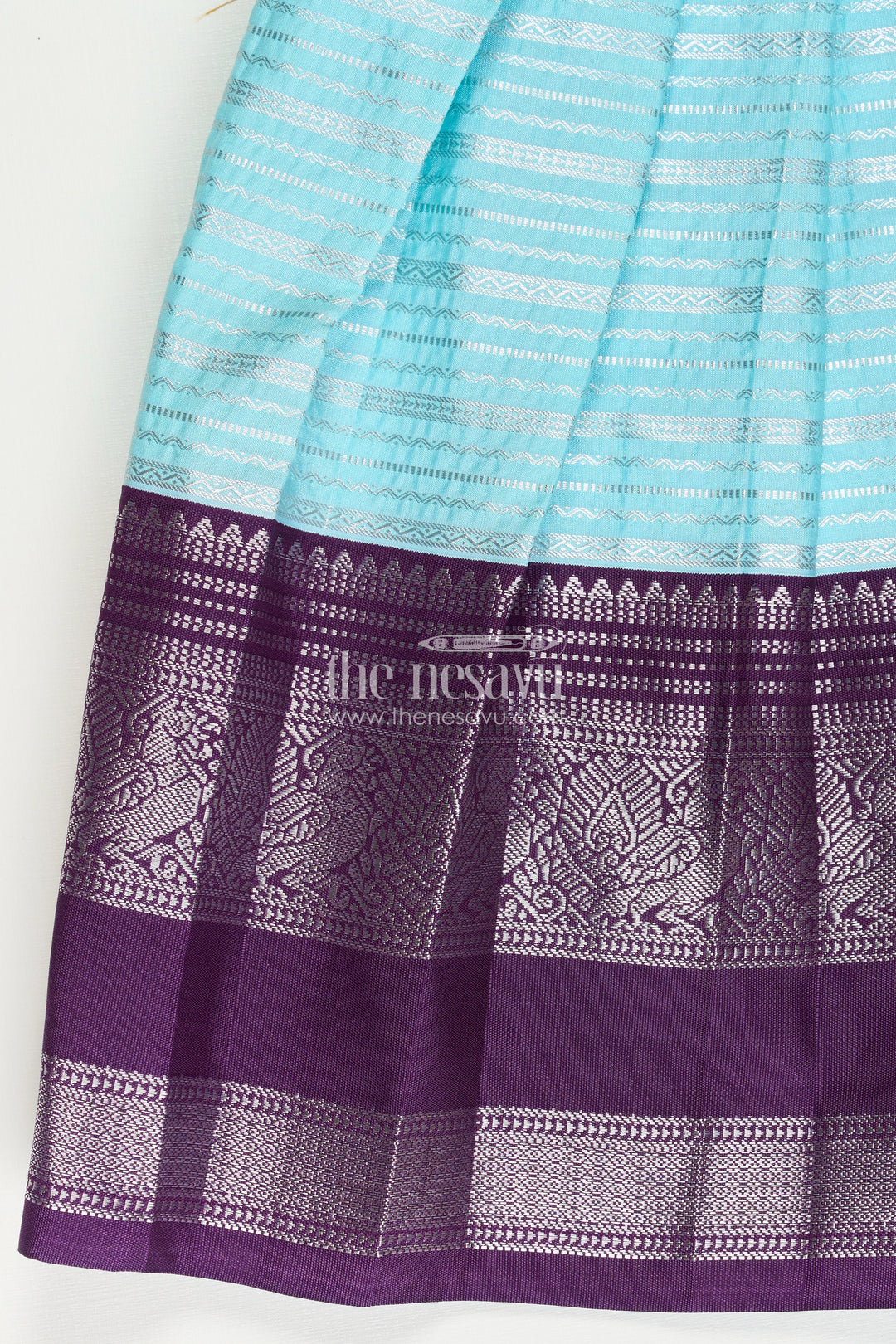 Girls Semi Kanchivaram Silk Frock with Layered Puff Sleeves and Contrast Borders in pleated dress Style