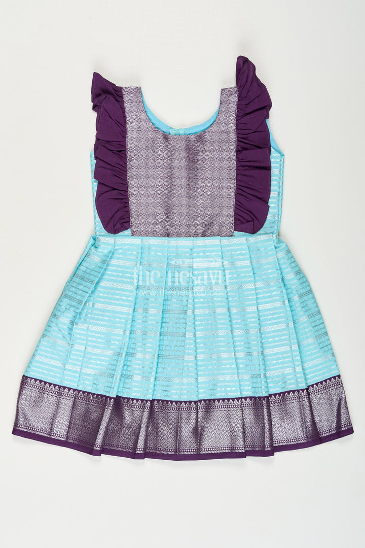Girls Semi Kanchivaram Silk Frock with Layered Puff Sleeves and Contrast Borders in pleated dress Style