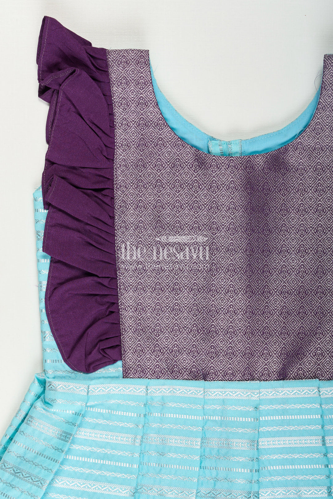 Girls Semi Kanchivaram Silk Frock with Layered Puff Sleeves and Contrast Borders in pleated dress Style