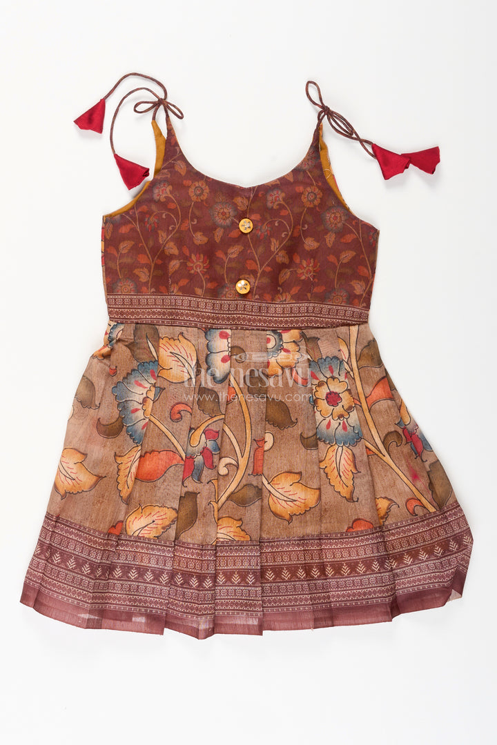 Cotton printed baby girl tie-up frock for summer outings and festive play
