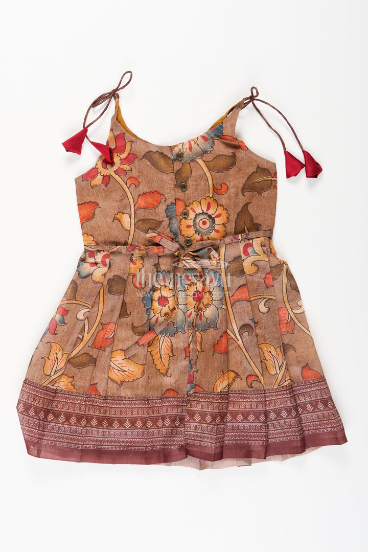 Cotton printed baby girl tie-up frock for summer outings and festive play