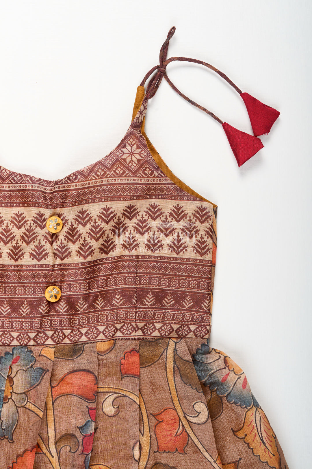 Cotton printed baby girl tie-up frock for summer outings and festive play