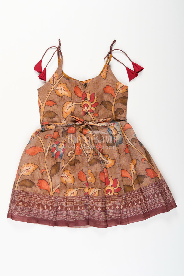 Cotton printed baby girl tie-up frock for summer outings and festive play