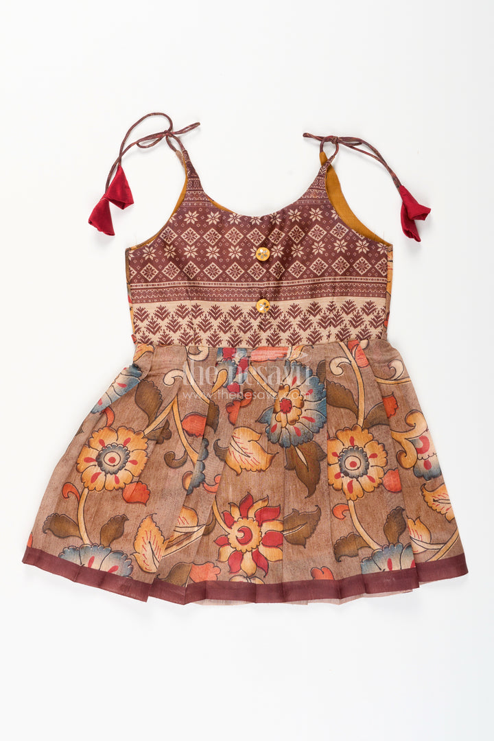 Cotton printed baby girl tie-up frock for summer outings and festive play