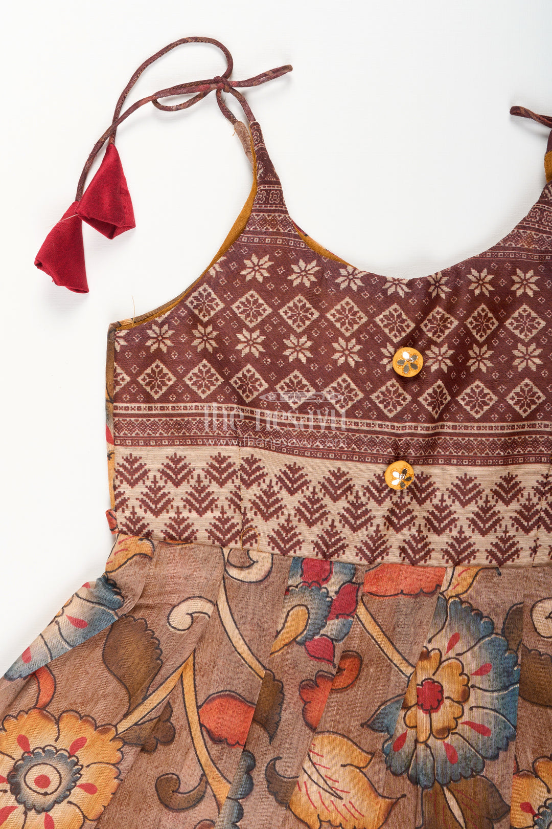 Cotton printed baby girl tie-up frock for summer outings and festive play