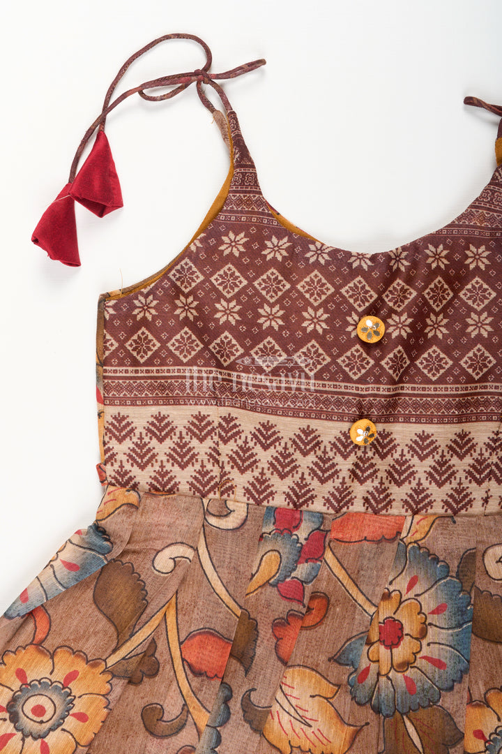 Cotton printed baby girl tie-up frock for summer outings and festive play