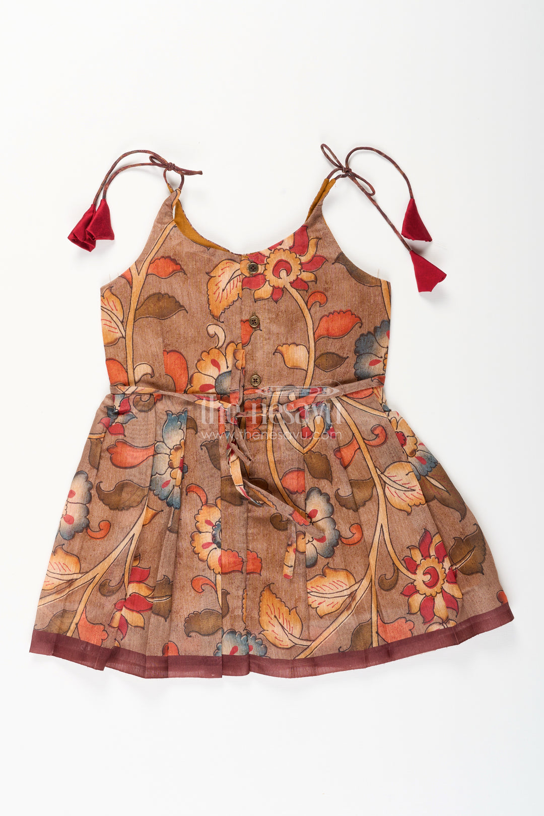 Cotton printed baby girl tie-up frock for summer outings and festive play