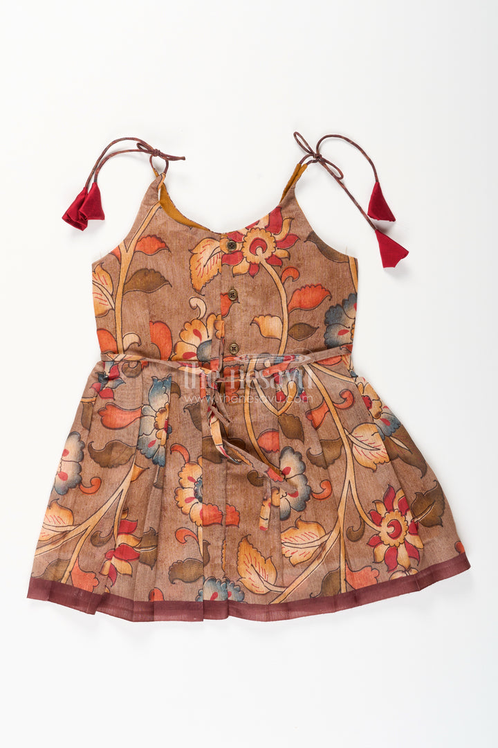 Cotton printed baby girl tie-up frock for summer outings and festive play