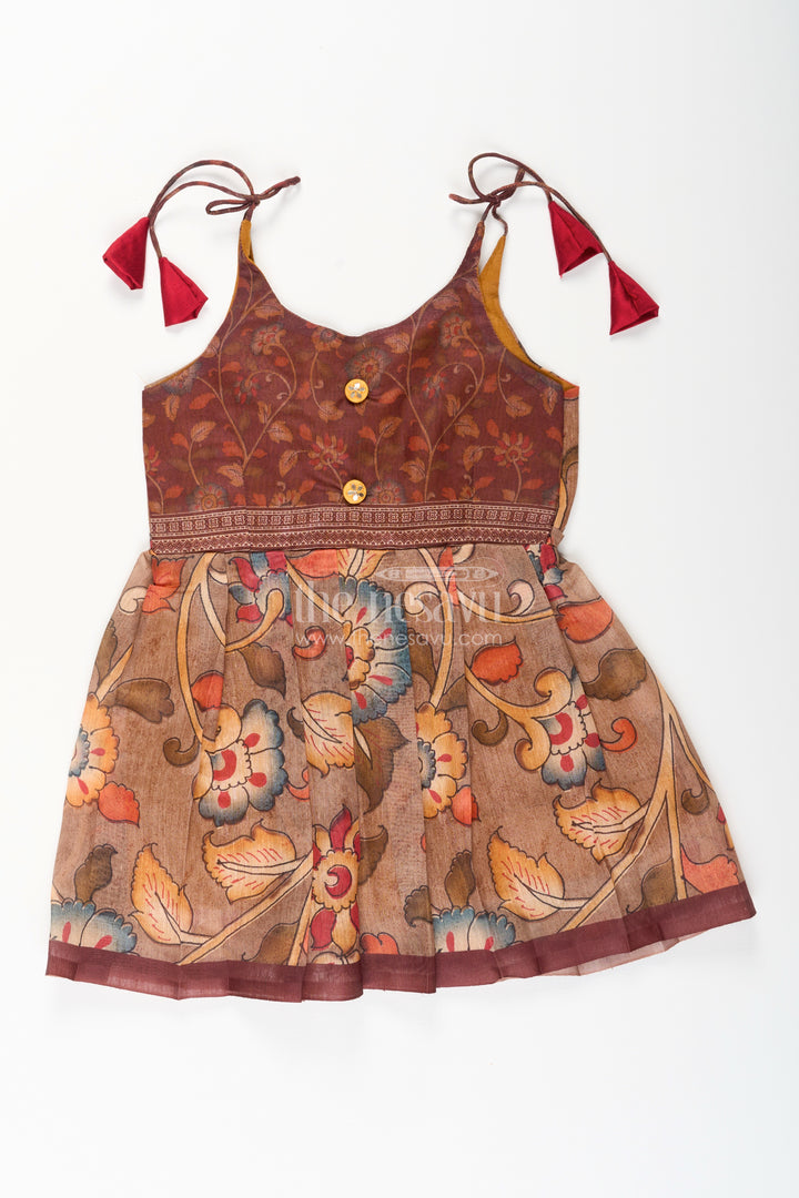 Cotton printed baby girl tie-up frock for summer outings and festive play