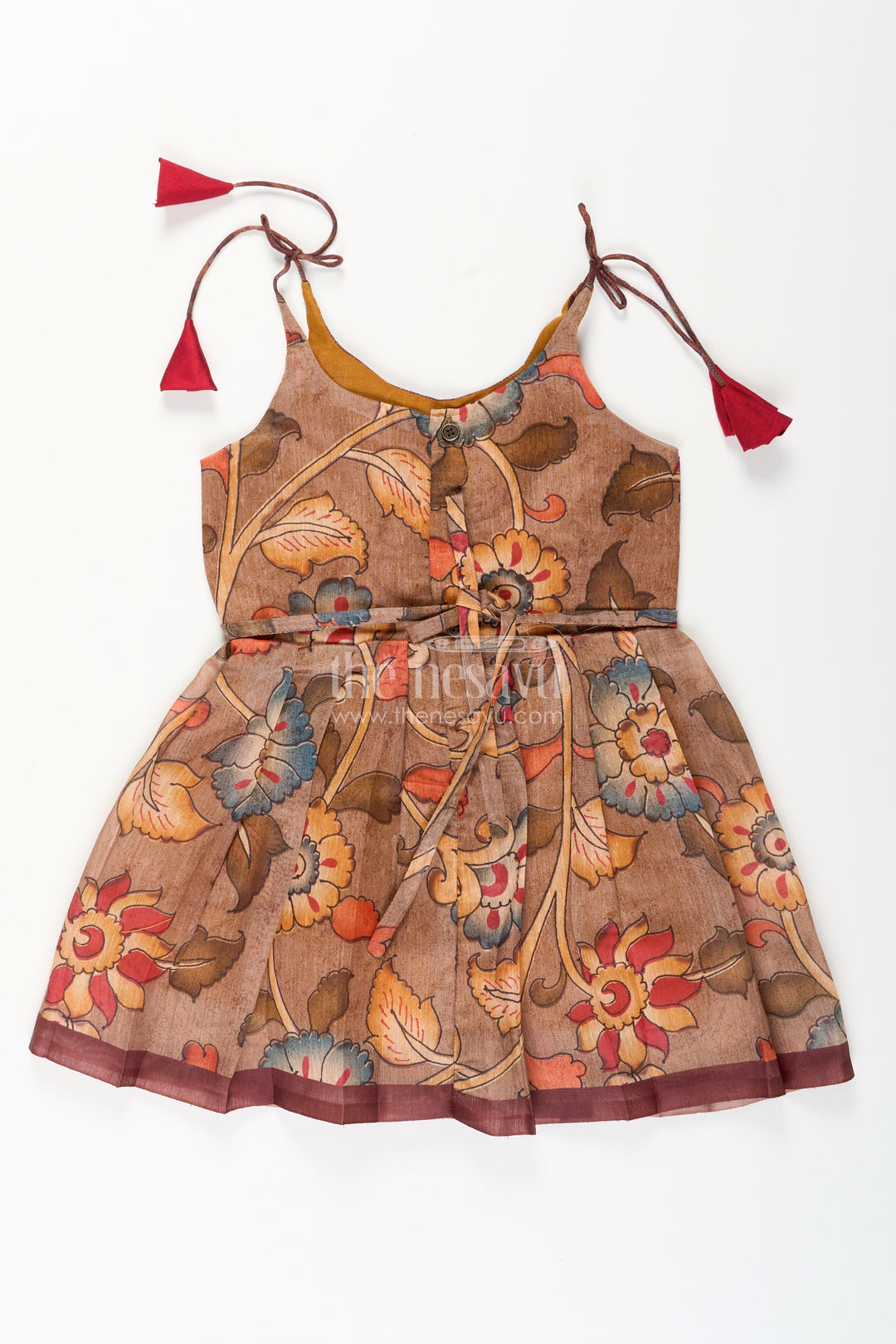 Cotton printed baby girl tie-up frock for summer outings and festive play