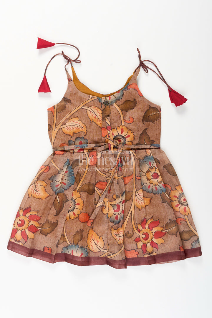Cotton printed baby girl tie-up frock for summer outings and festive play