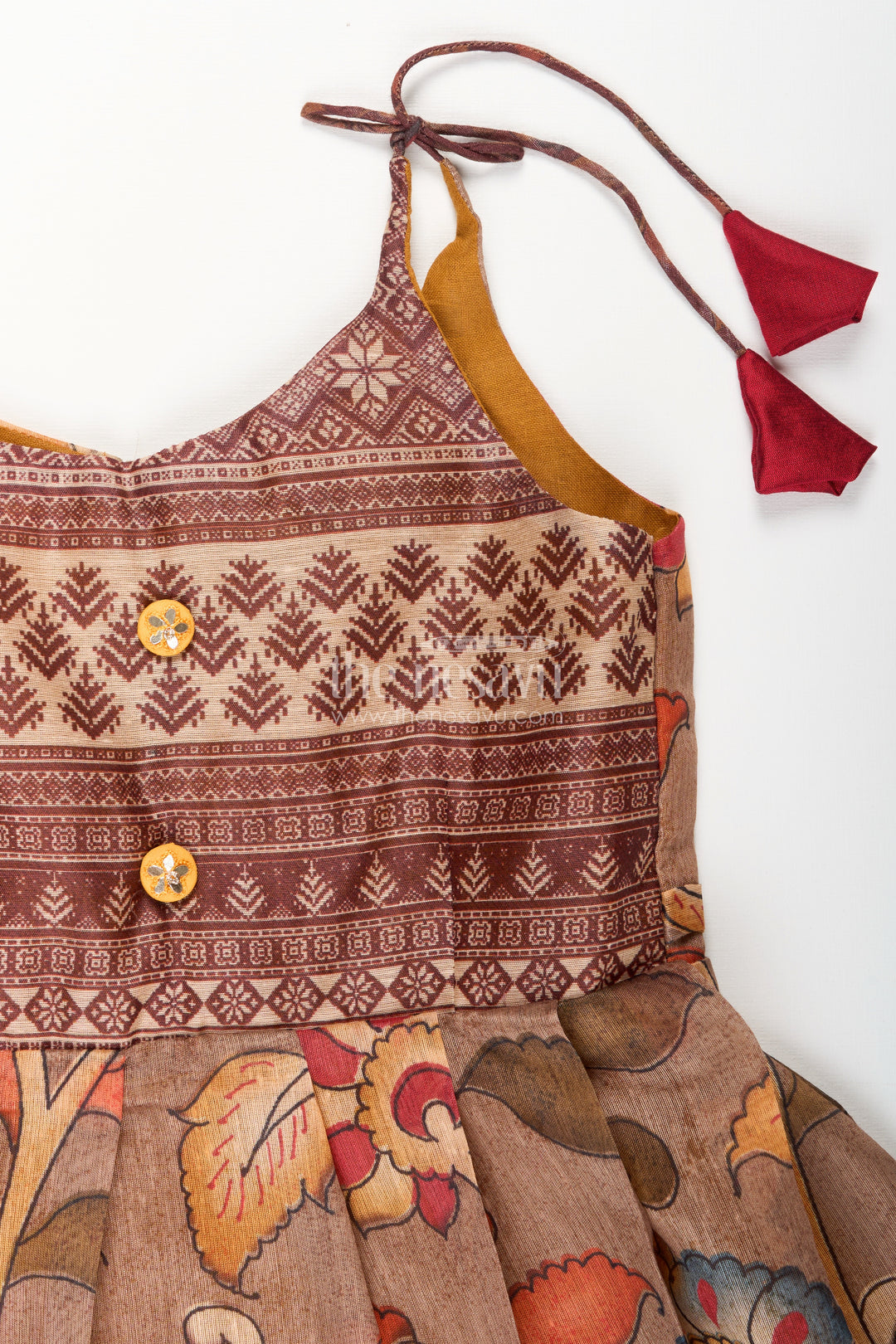 Cotton printed baby girl tie-up frock for summer outings and festive play