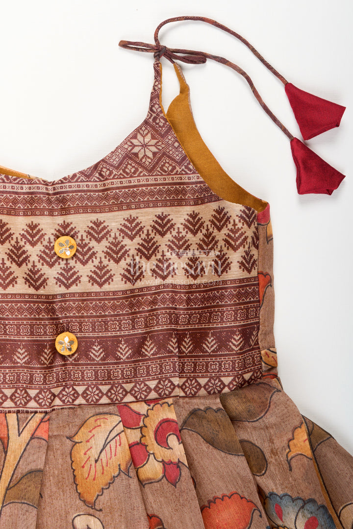 Cotton printed baby girl tie-up frock for summer outings and festive play