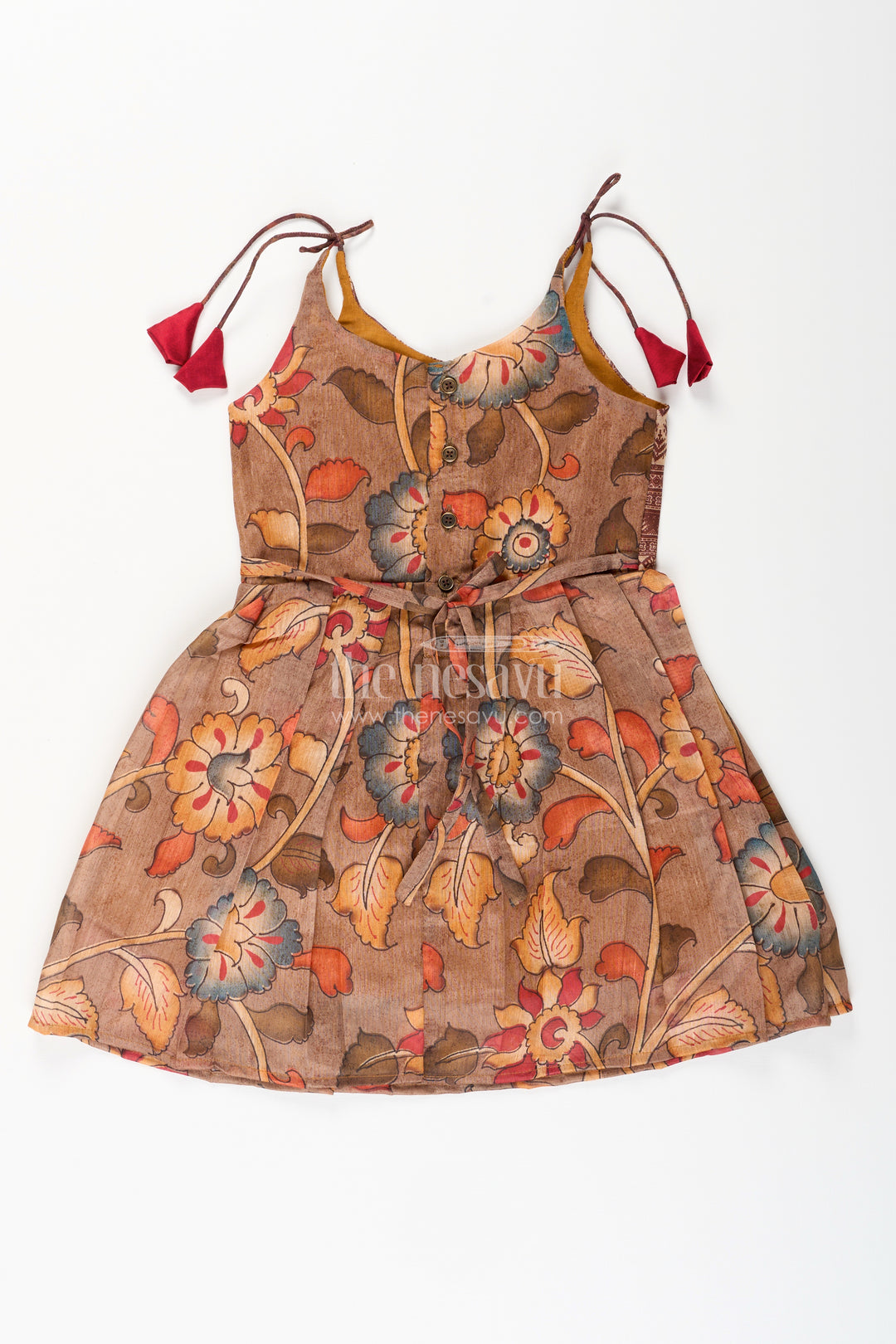 Cotton printed baby girl tie-up frock for summer outings and festive play
