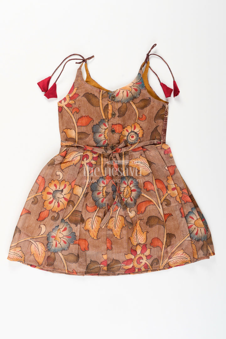 Cotton printed baby girl tie-up frock for summer outings and festive play