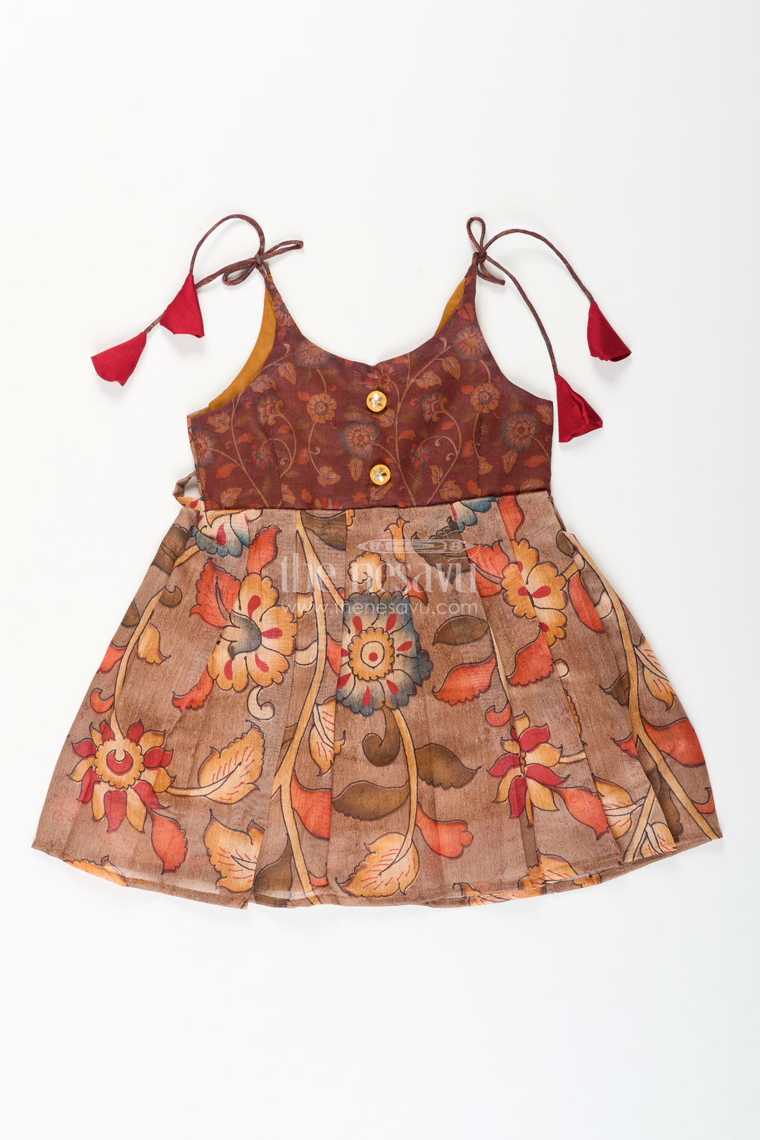 Cotton printed baby girl tie-up frock for summer outings and festive play