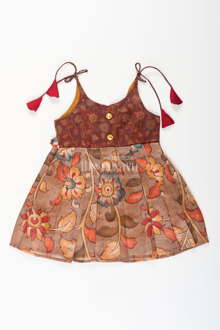 Cotton printed baby girl tie-up frock for summer outings and festive play