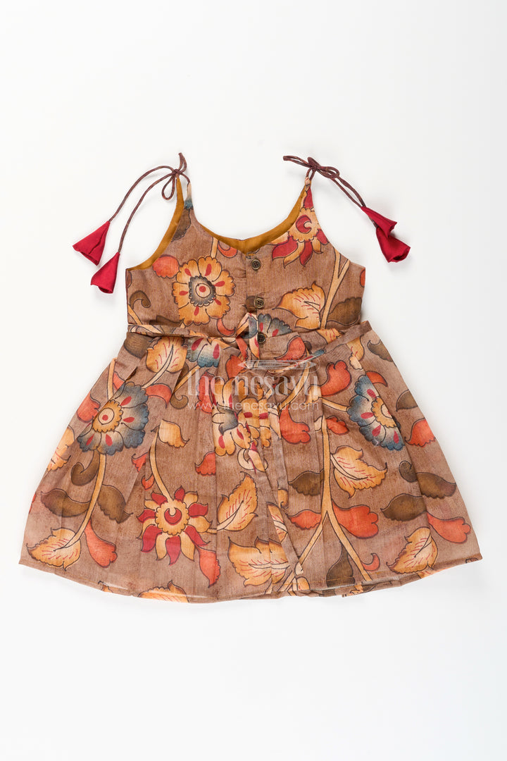 Cotton printed baby girl tie-up frock for summer outings and festive play